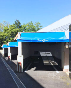 駐車場屋根テント＋シェードのシート張替え工事をホテル施設にて実施