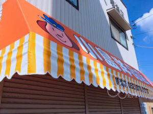 フルカラープリントの店舗用テントのシート張替え