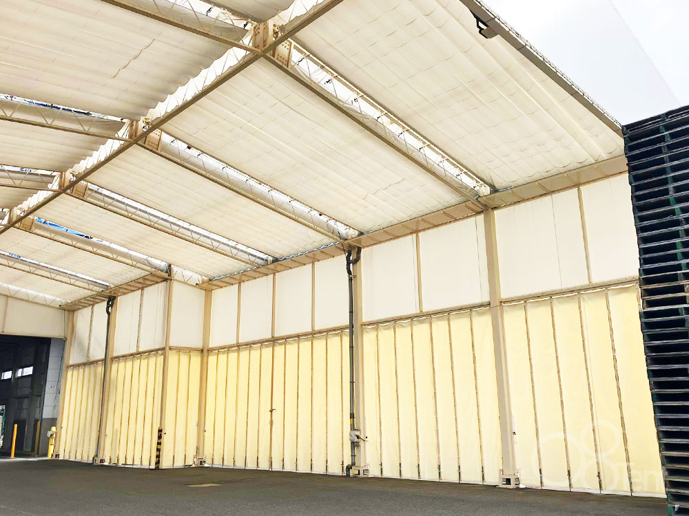 荷捌きテント上屋の側面カーテンのシート張替え